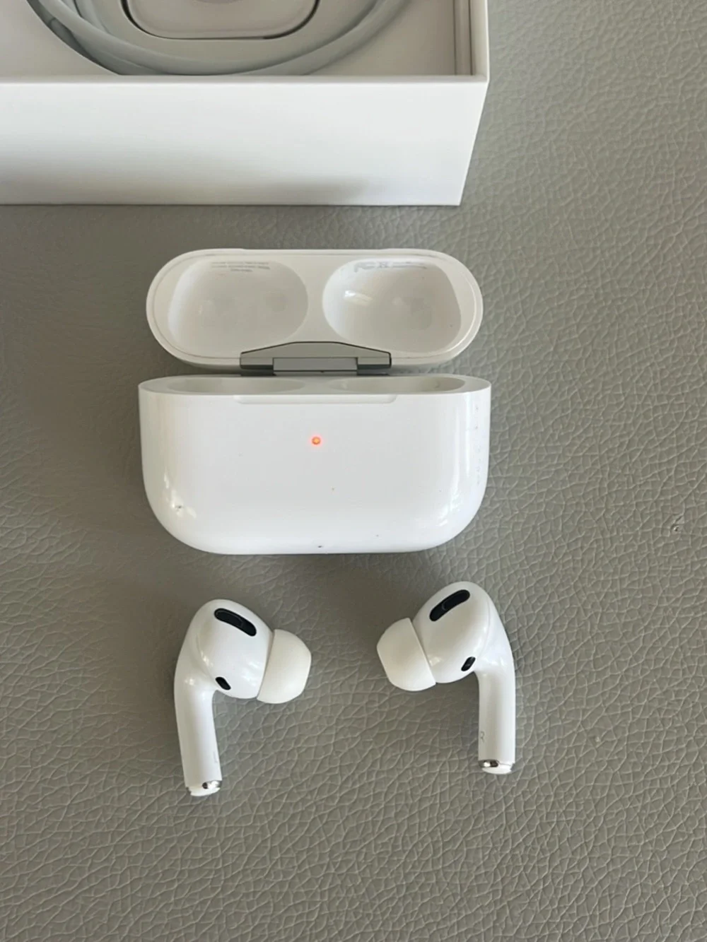 Apple AirPods Pro with charging cord